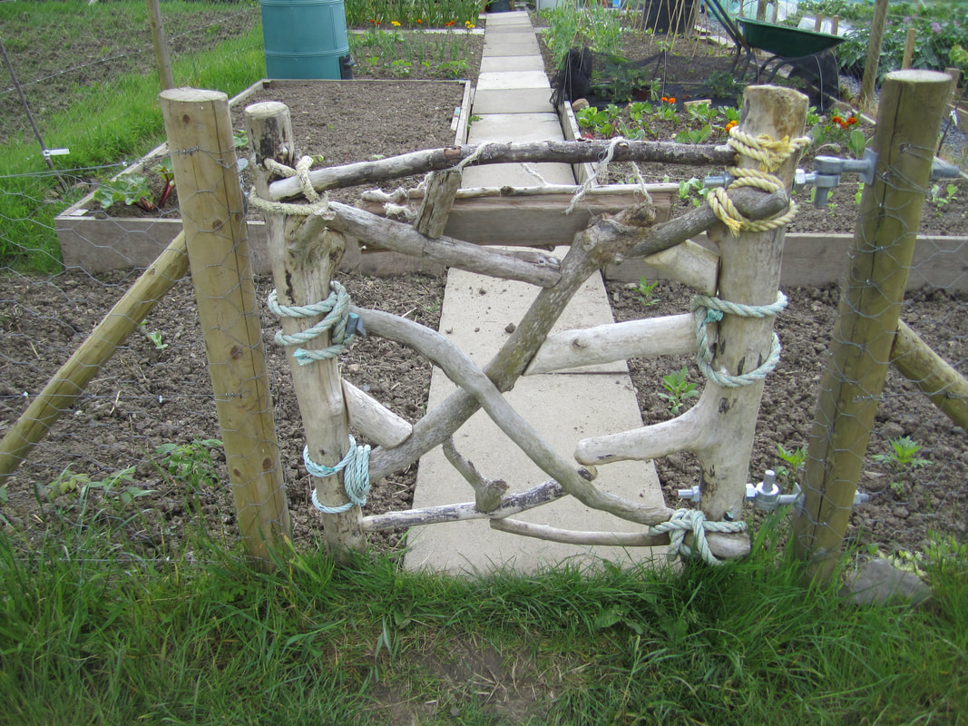 Image Gate made out of driftwood Allotments in East Wiliamston
